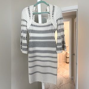 Herve Leger bandage dress. Black and white bell sleeves, open back. Worn once